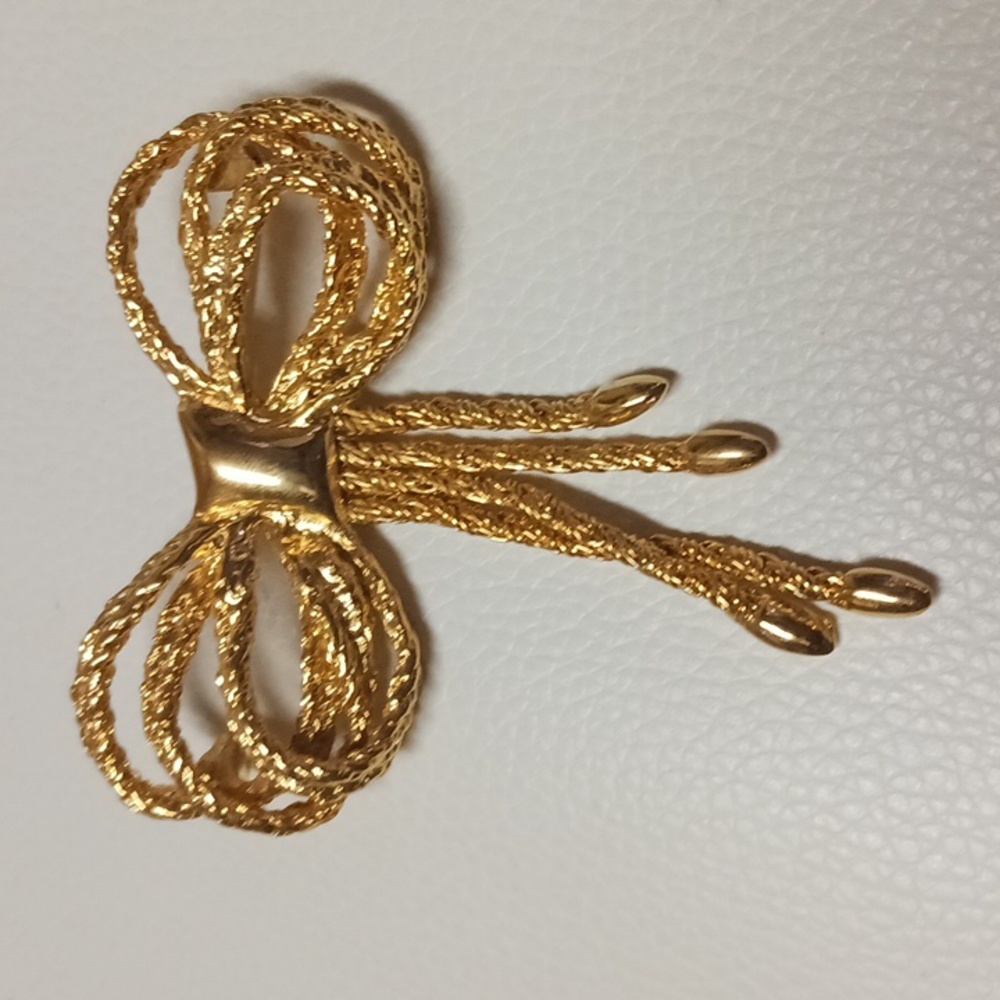 Gold bone pendant